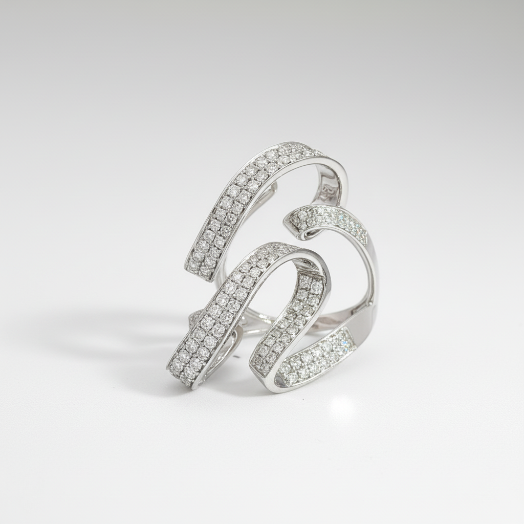 Silver ring with diamond accents on a light gray background