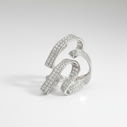 Silver ring with diamond accents on a light gray background